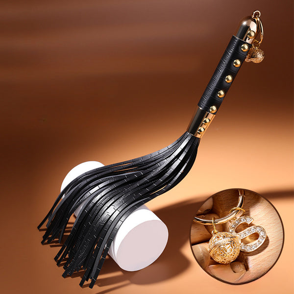Golden Tassel Leather Flogger